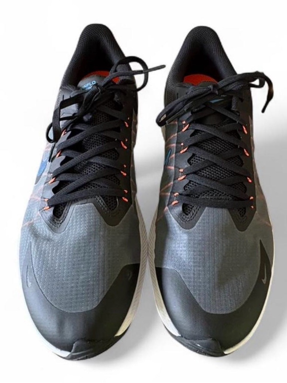 Nike Men’s Black and Gray Athletic Running Shoes with Orange Accents